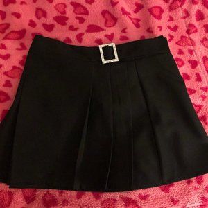 Black skirt with buckle from Urban Outfitters